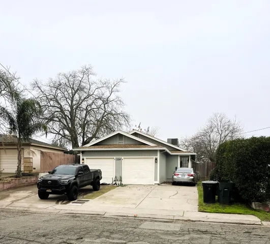 a car parked in front of a house