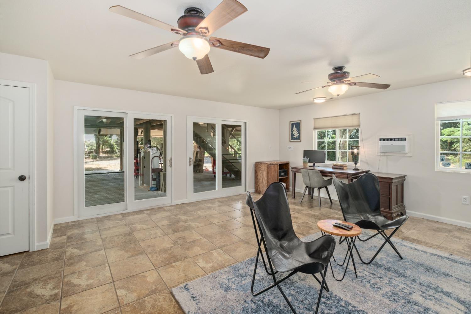 29001 Ave 22 Madera, CA 93638 - Photo 11 of 31 a view of a livingroom with furniture and a window