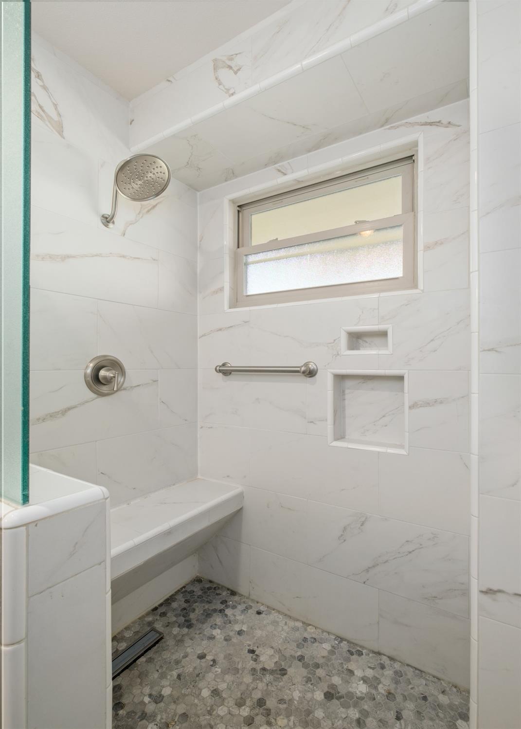 29001 Ave 22 Madera, CA 93638 - Photo 17 of 31 a bathroom with a window and a shower