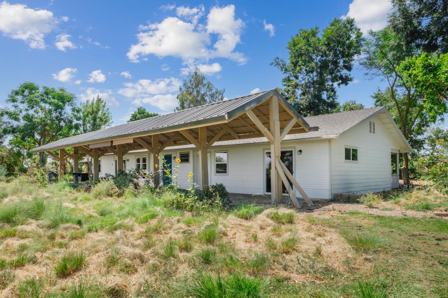 29001 Ave 22 Madera, CA 93638 - Photo 22 of 31 a front view of house with garden