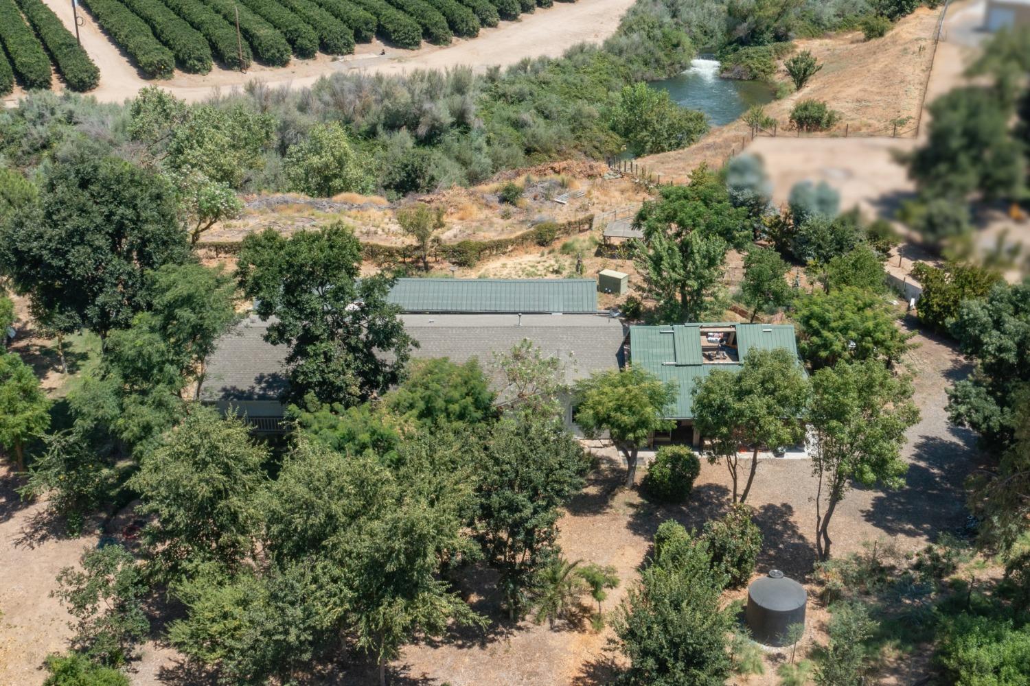 29001 Ave 22 Madera, CA 93638 - Photo 28 of 31 a view of a house with a yard and sitting area