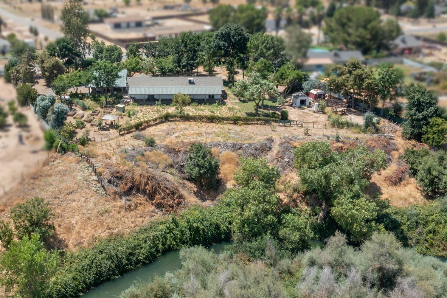 29001 Ave 22 Madera, CA 93638 - Photo 29 of 31 an aerial view of residential house with outdoor space