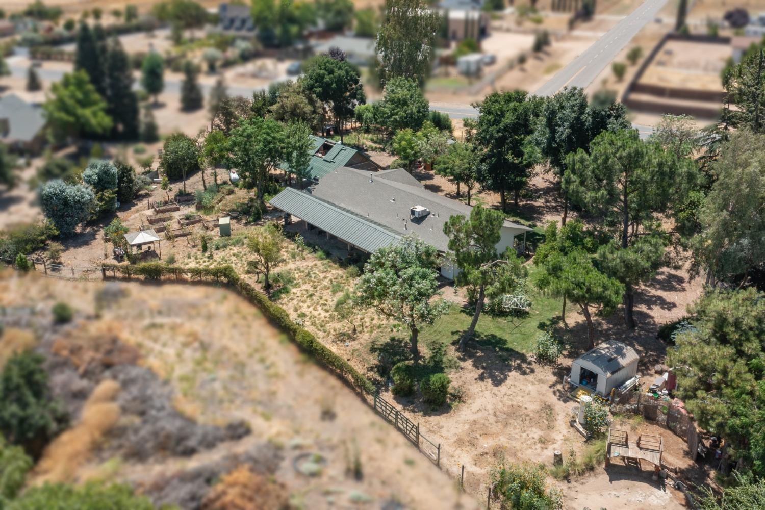 29001 Ave 22 Madera, CA 93638 - Photo 30 of 31 an aerial view of a house with a yard