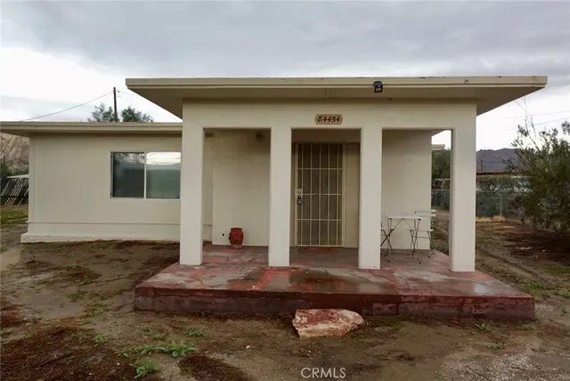 a front view of a house with entertaining space