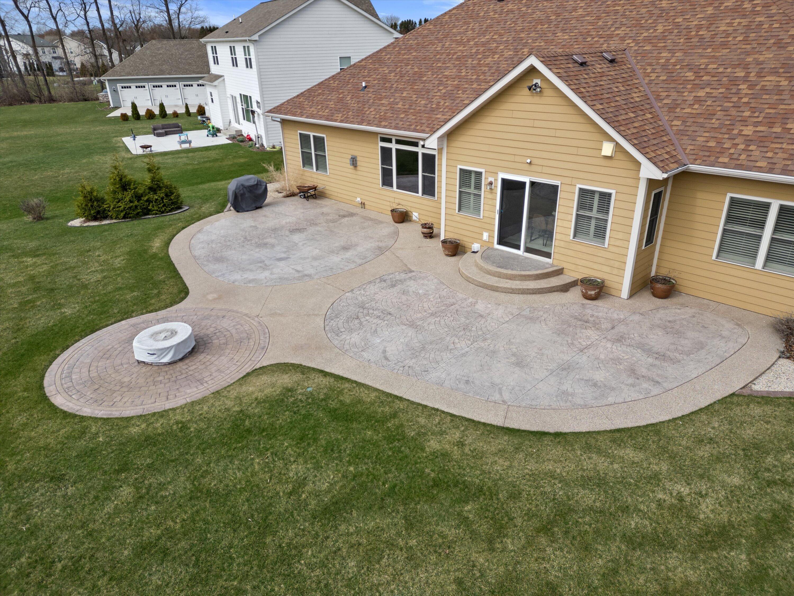 2757 Cornerstone Way Mount Pleasant, WI 53403 - Photo 28 of 34 Patio with Fire Pit
