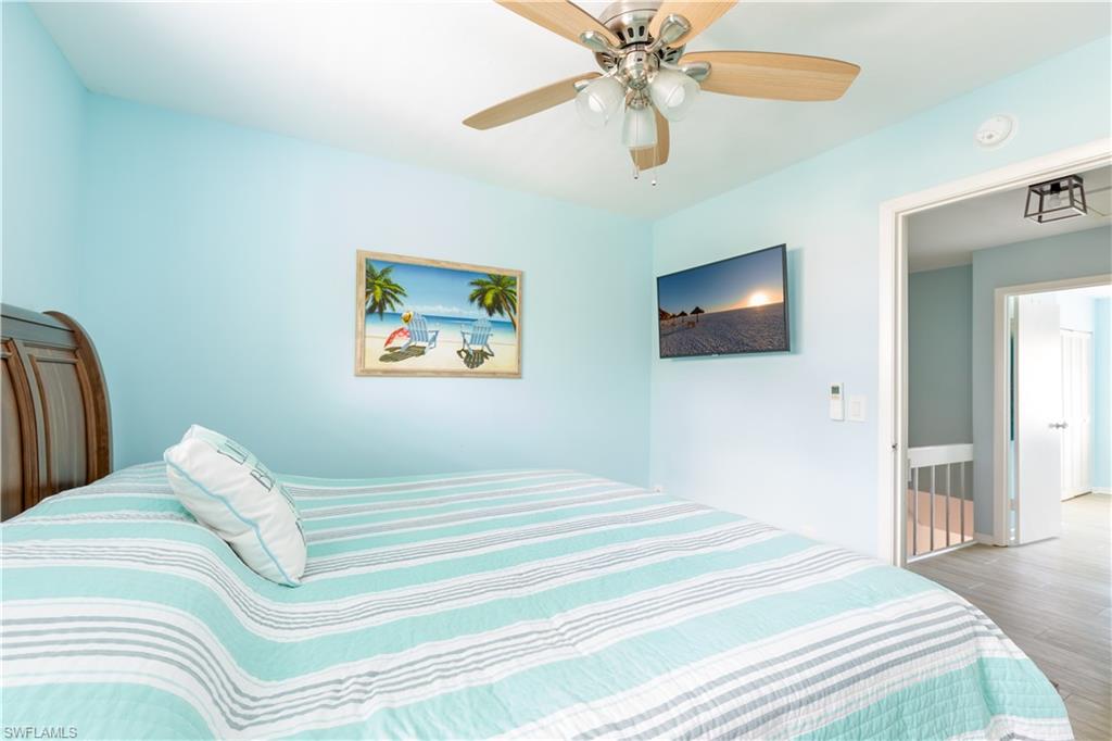 87 North Collier Boulevard, Unit J18 Marco Island, FL 34145 - Photo 9 of 21 Bedroom 1 with king bed
