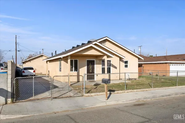 a view of a house with a street