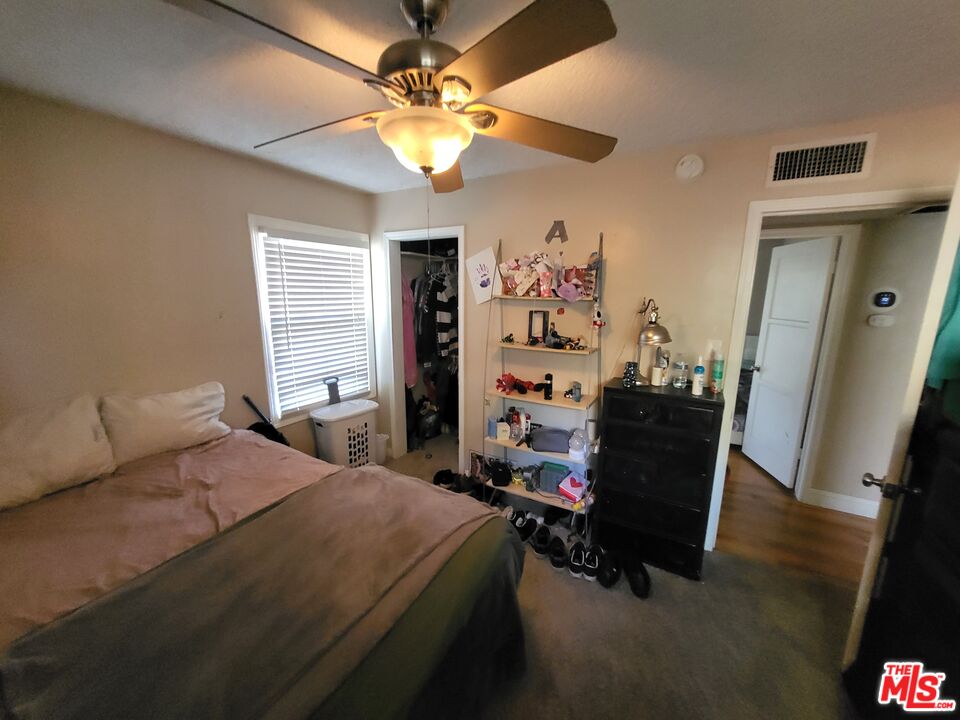 2831 Pine Street Bakersfield, CA 93301 - Photo 20 of 33 a bedroom with a bed and furniture