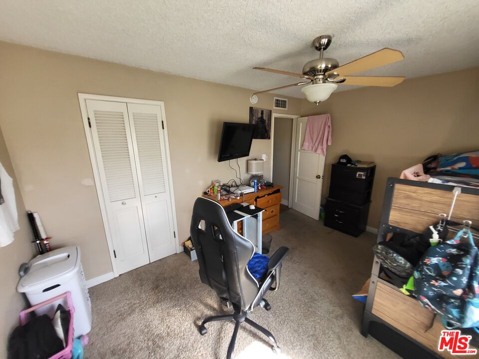 2831 Pine Street Bakersfield, CA 93301 - Photo 24 of 33 a view of a room with gym equipment