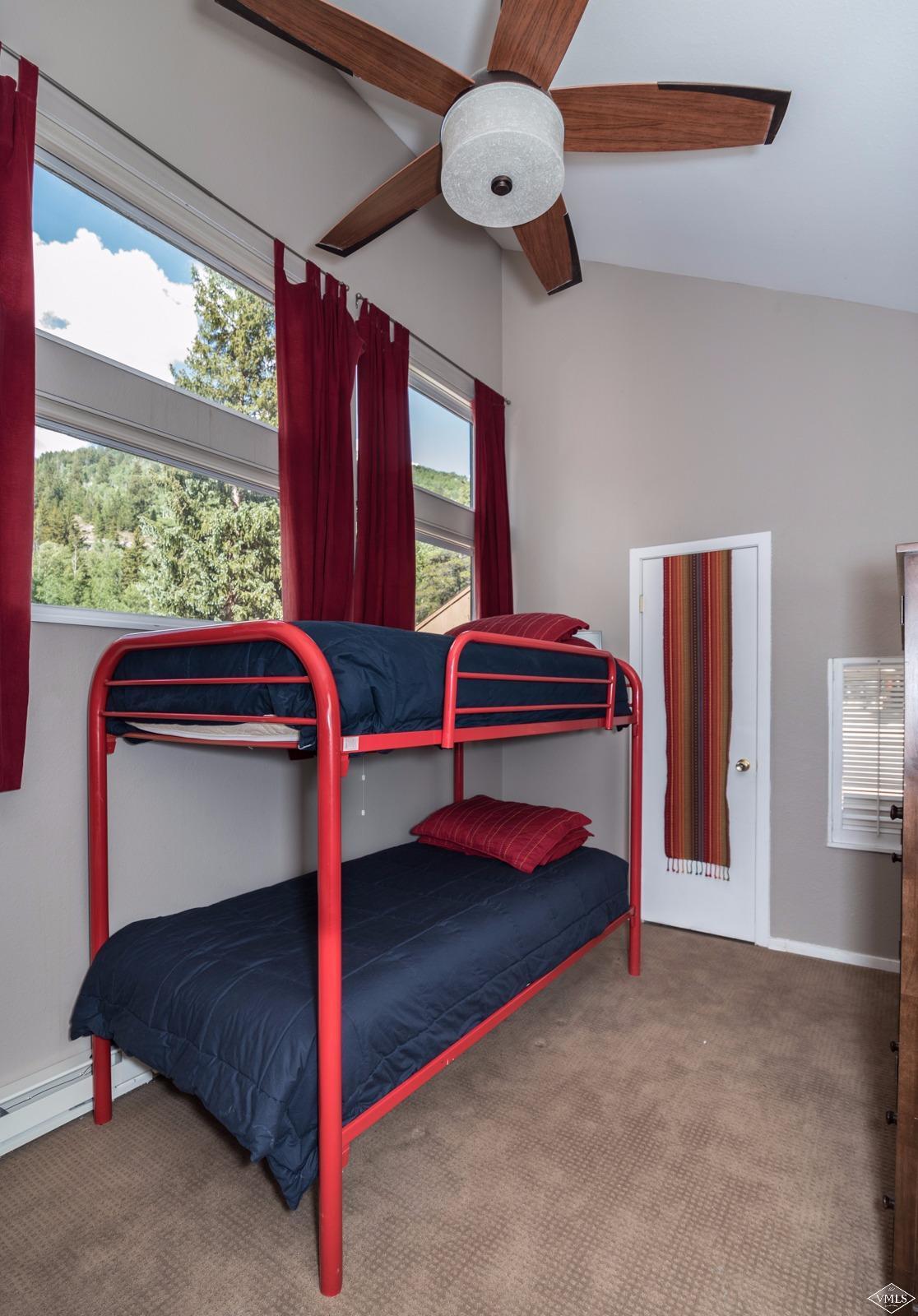 3901 Big Horn Road, Unit 2H Vail, CO 81657 - Photo 13 of 16 a bedroom with a bunk bed and a ceiling fan