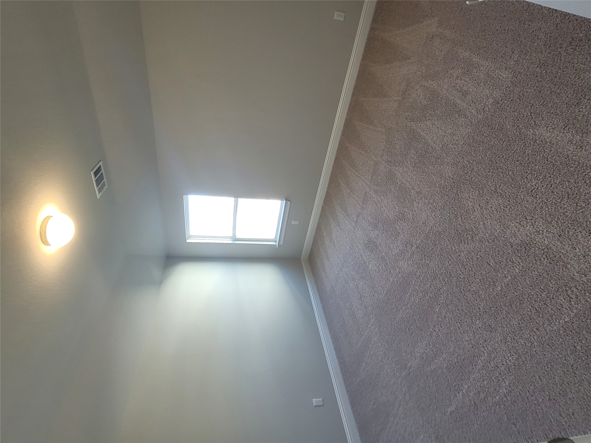 120 Free Stone Drive Georgetown, TX 78628 - Photo 19 of 40 An inviting room awaits personalization, complete with soft carpeting and a window bathing the space in natural light.