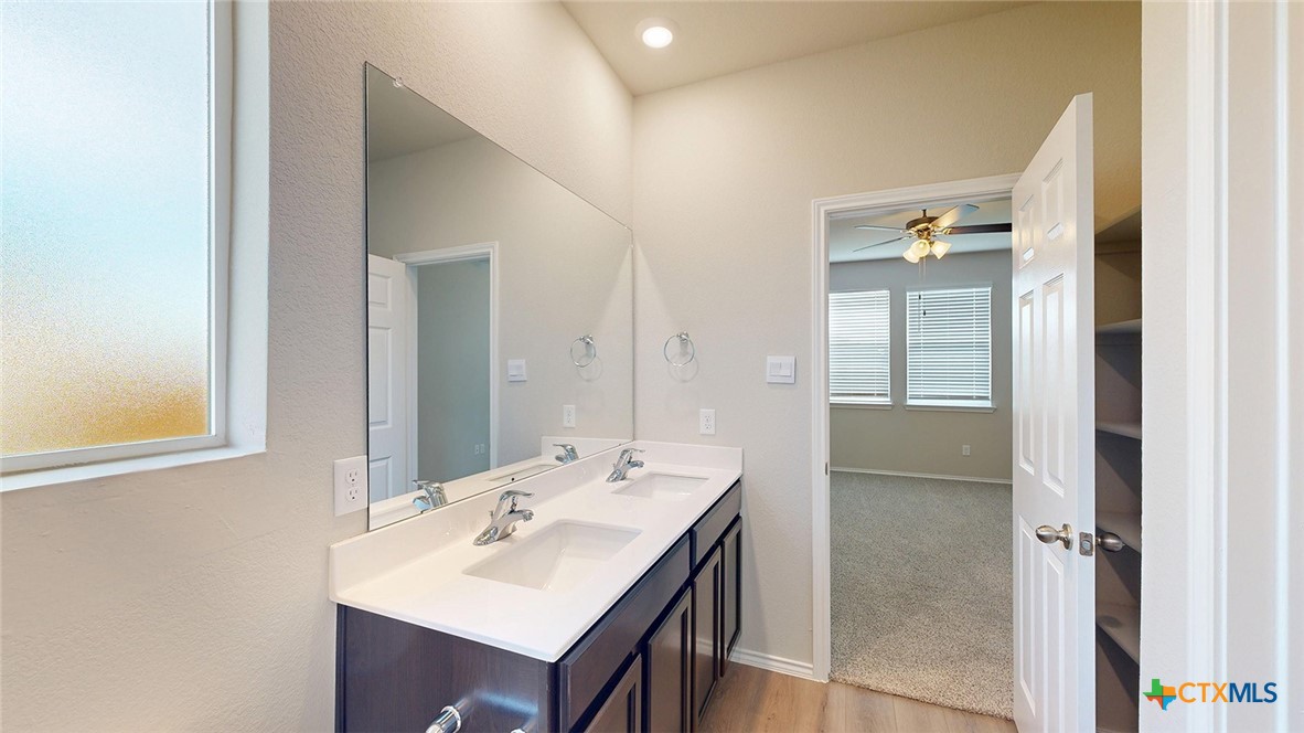 1110 Stone Vly Road Temple, TX 76502 - Photo 7 of 21 a bathroom with a sink and a mirror