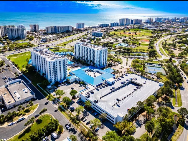 a view of a balcony with chairs