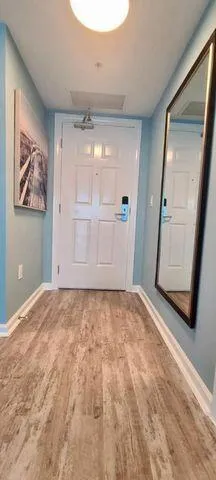 a view of balcony with furniture