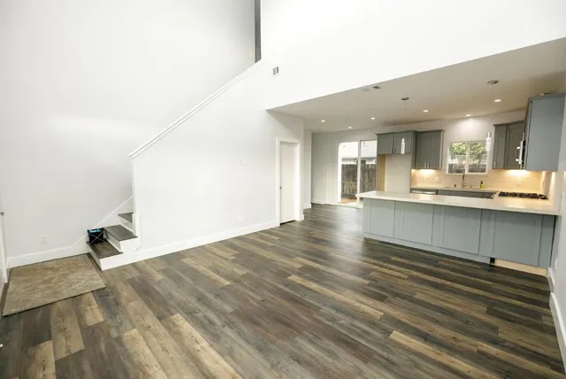 a view of kitchen and kitchen with sink