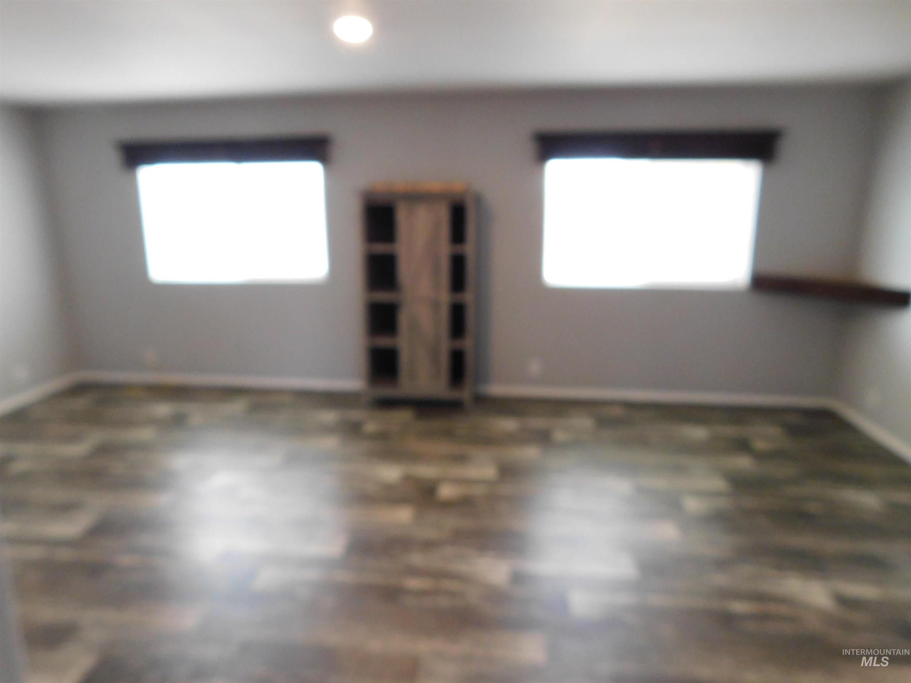 26915 Chips Lane Parma, ID 83660 - Photo 13 of 48 Empty room with healthy amount of natural light and recessed lighting