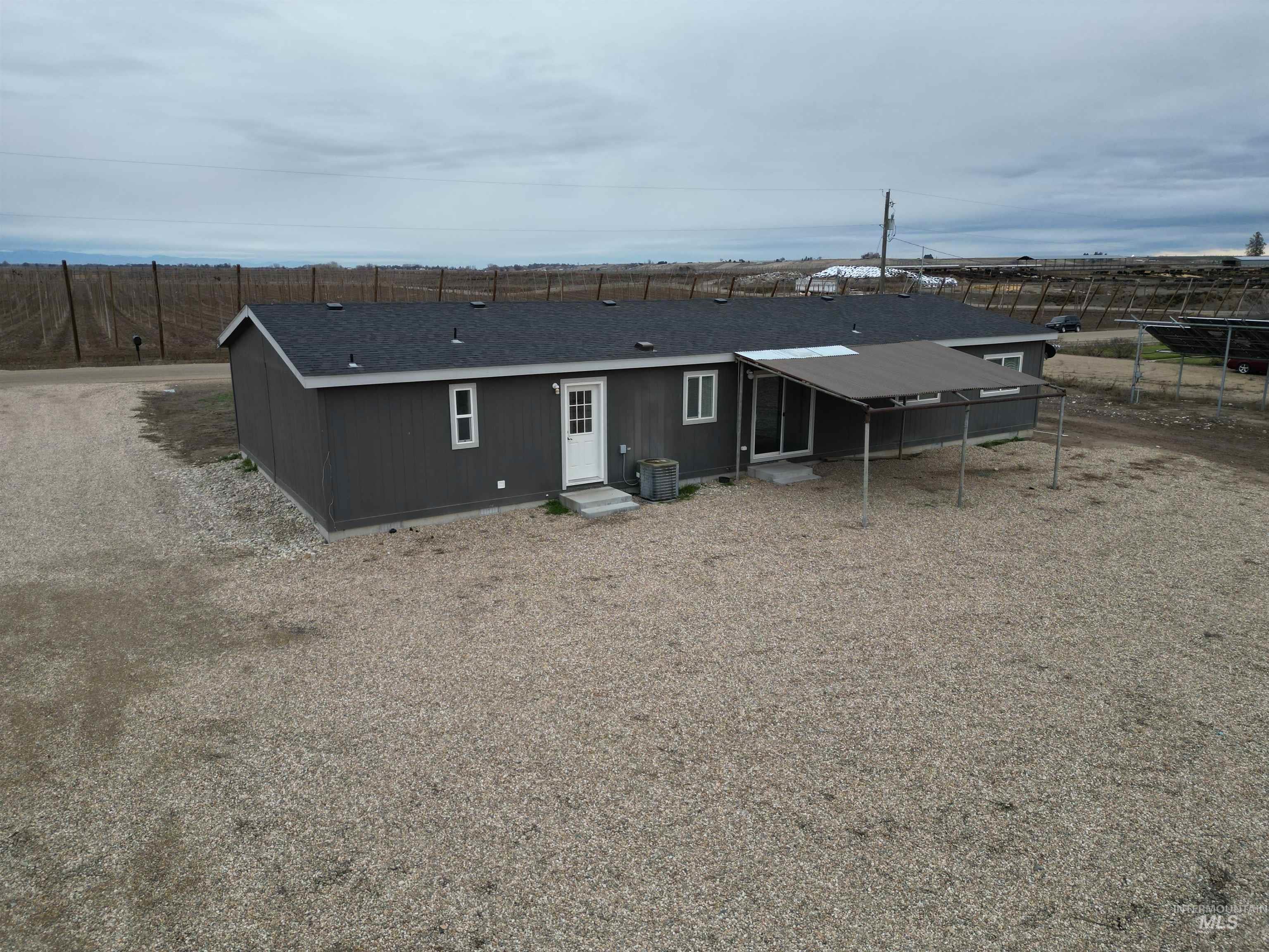 26915 Chips Lane Parma, ID 83660 - Photo 20 of 48 Rear view of house
