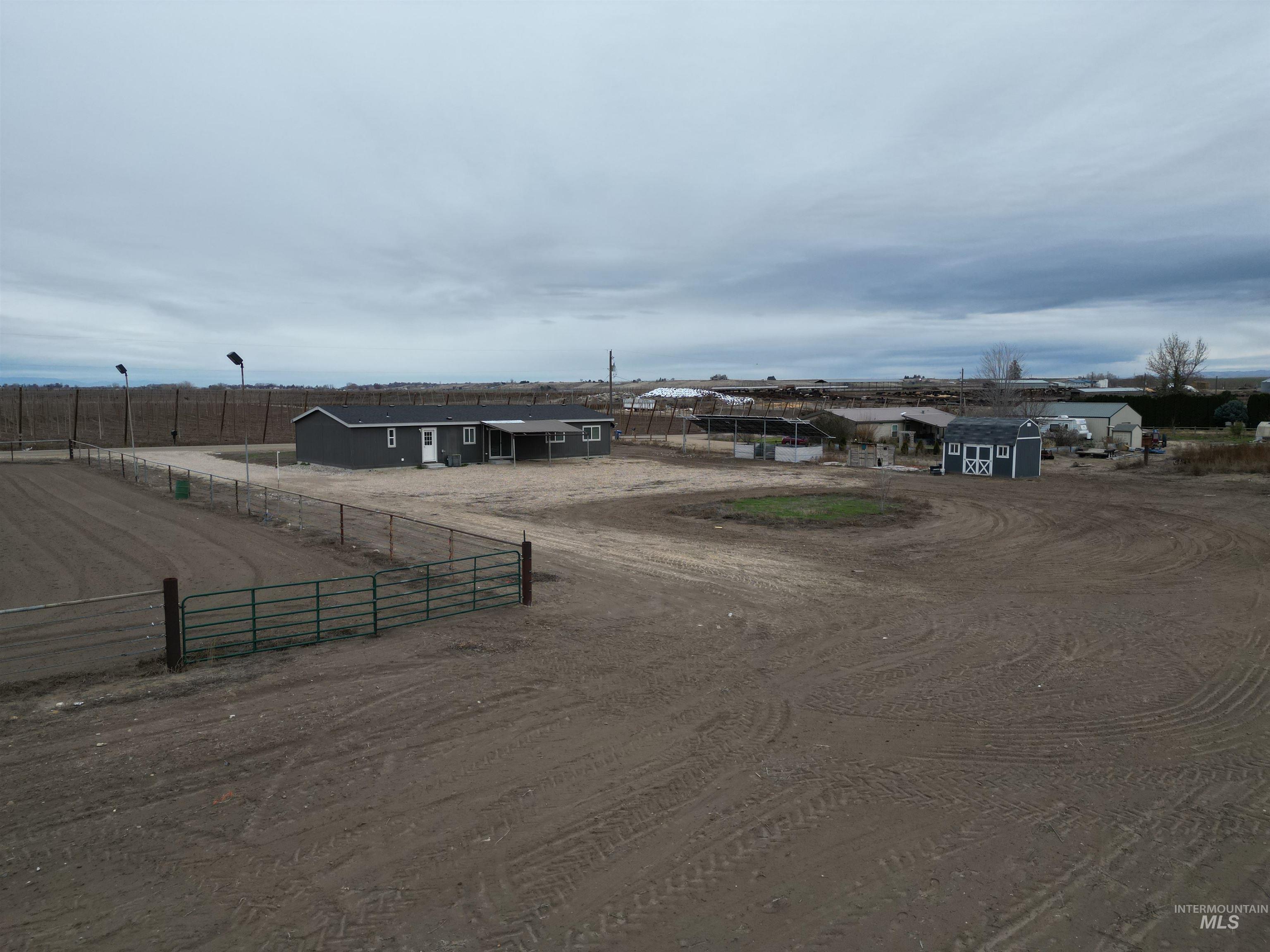 26915 Chips Lane Parma, ID 83660 - Photo 30 of 48 View of yard featuring an outdoor structure and a rural view