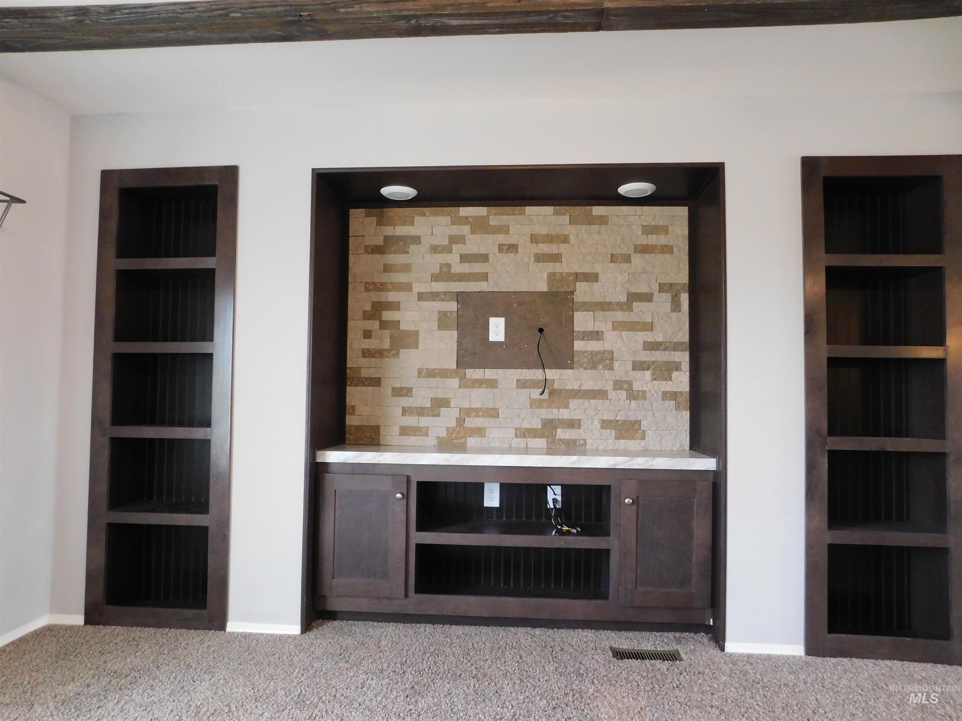 26915 Chips Lane Parma, ID 83660 - Photo 4 of 48 Detailed view of built in shelves and carpet floors