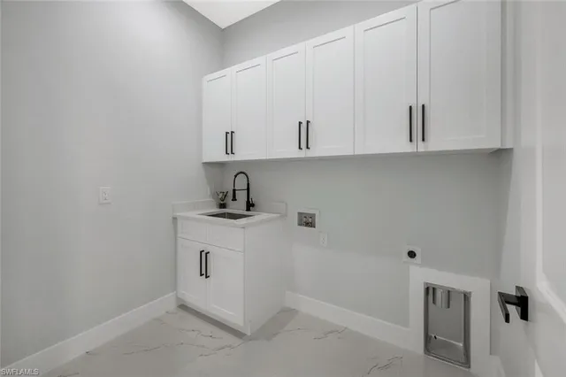 a view of cabinets with sink