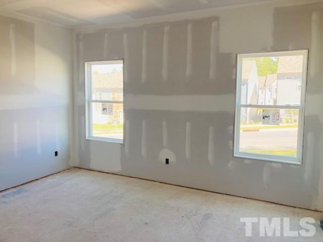 813 Star Rdg Drive Raleigh, NC 27610 - Photo 13 of 21 a view of an empty room with a window