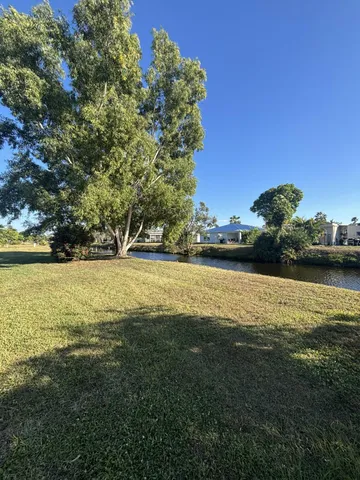a view of an ocean and yard