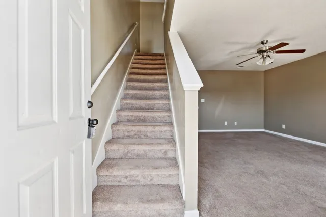 a view of staircase with white walls and white walls