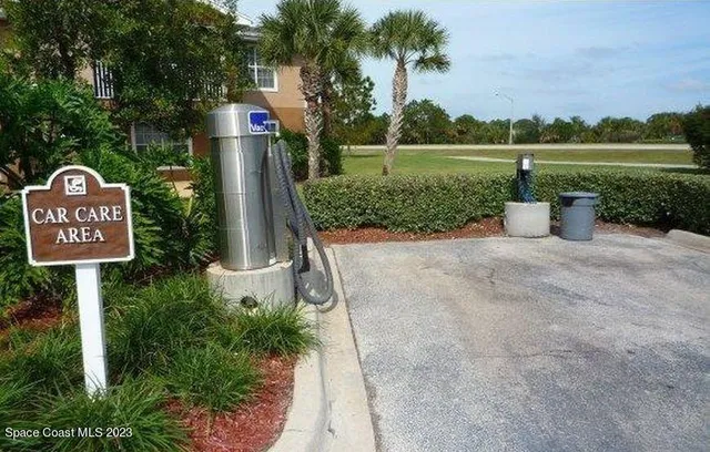 a view of a lake with houses in the back