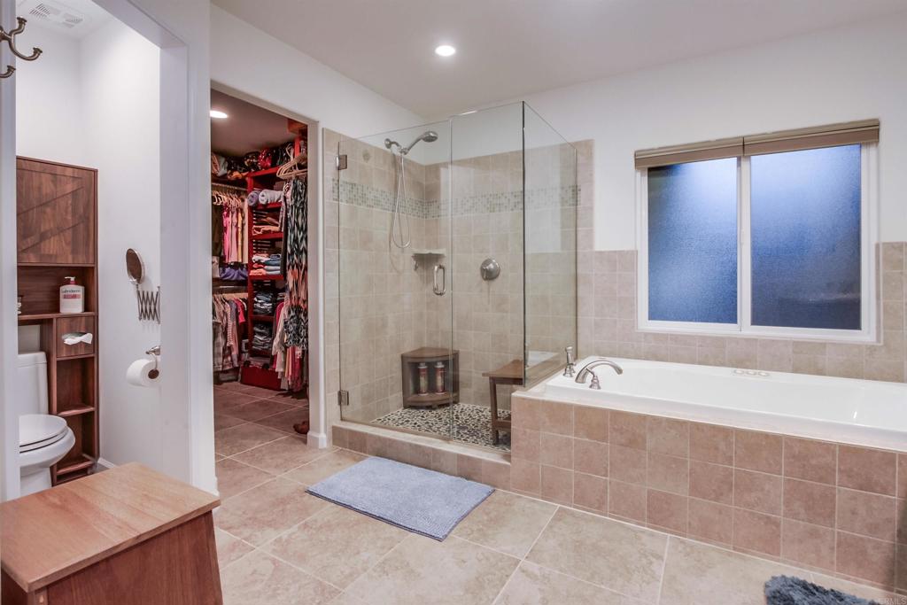 1321 Friends Way Fallbrook, CA 92028 - Photo 35 of 71 a spacious bathroom with a tub shower and a sink