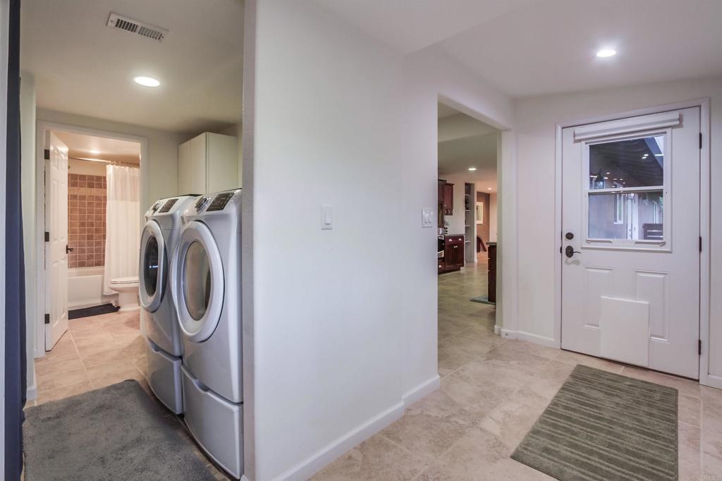 1321 Friends Way Fallbrook, CA 92028 - Photo 45 of 71 a view of a storage & utility room with washer and dryer