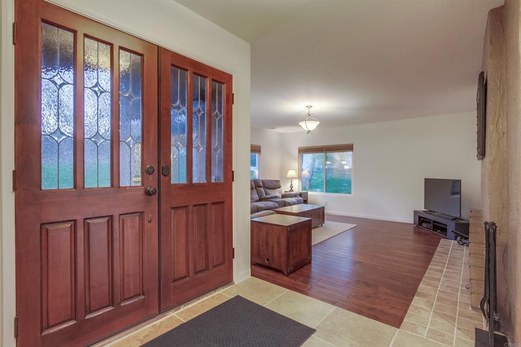 1321 Friends Way Fallbrook, CA 92028 - Photo 6 of 71 a view of a hallway with furniture and staircase