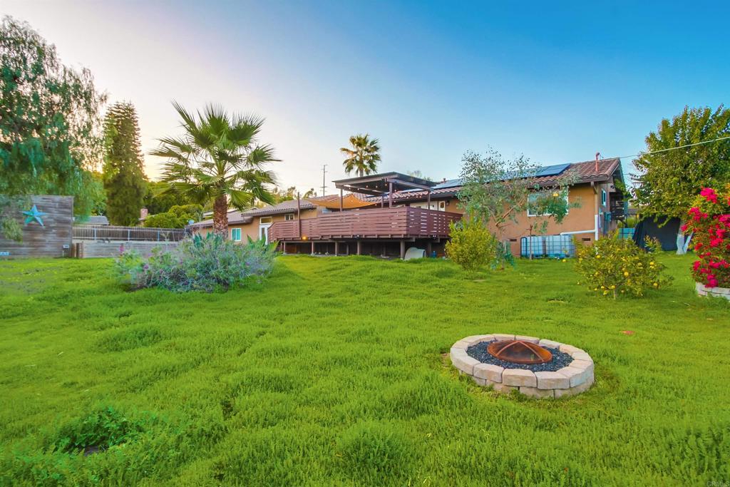 1321 Friends Way Fallbrook, CA 92028 - Photo 66 of 71 a view of a table and chairs in the garden