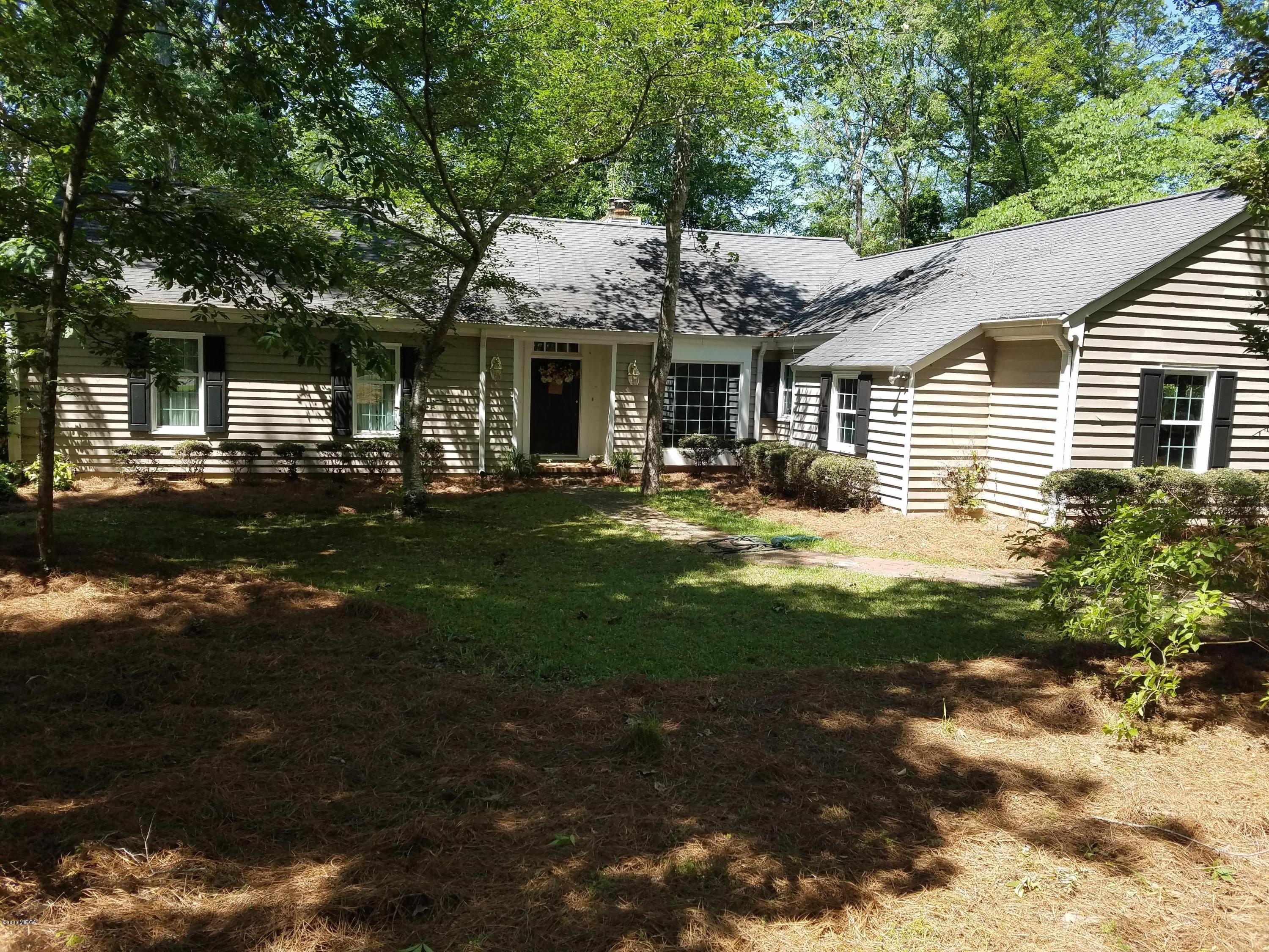 440 Stone Edge Road Macon, GA 31210 - Photo 1 of 5 a front view of a house with a yard