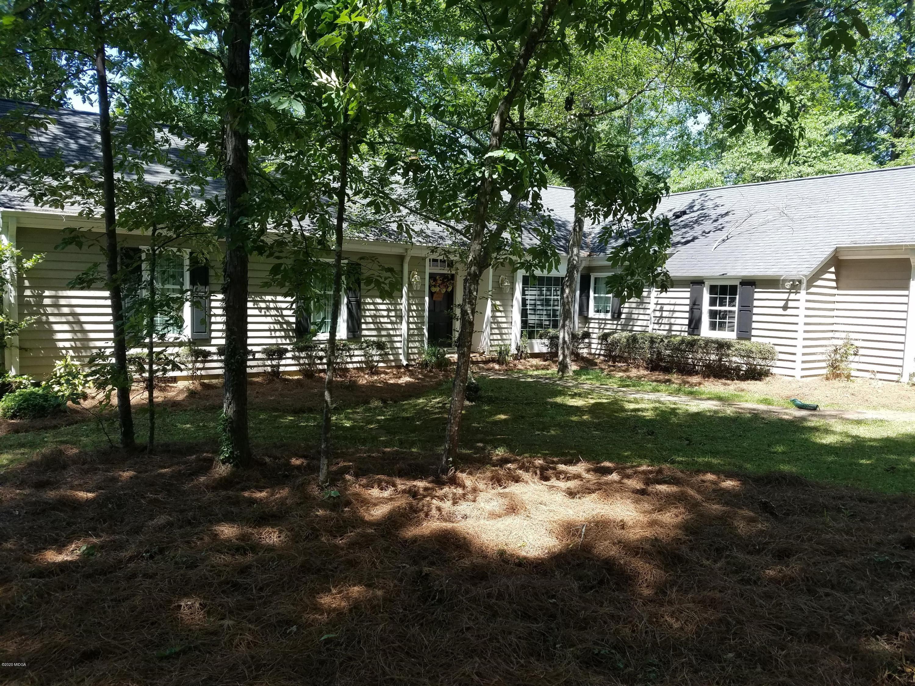440 Stone Edge Road Macon, GA 31210 - Photo 2 of 5 a front view of house with yard and green space