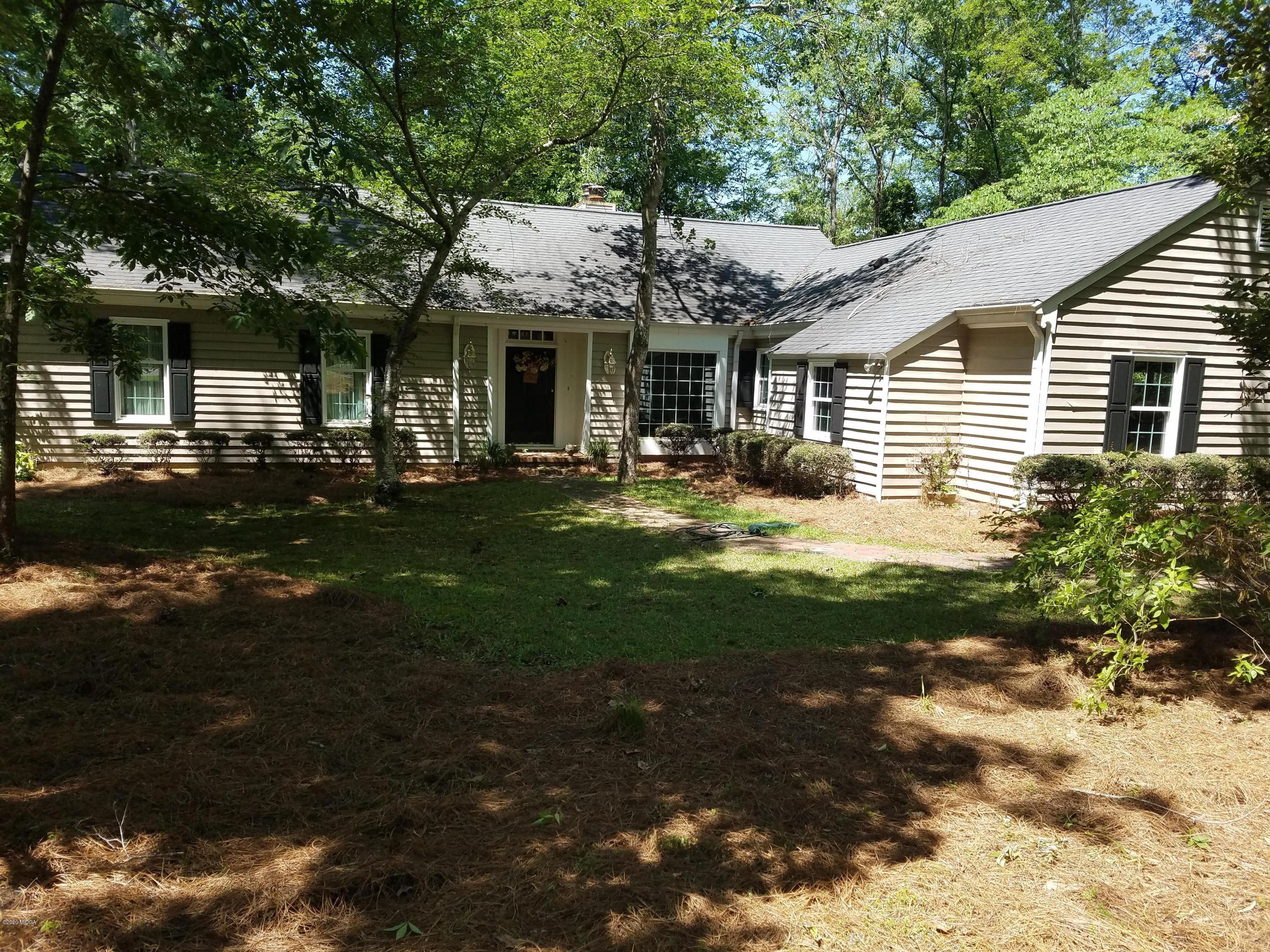 440 Stone Edge Road Macon, GA 31210 - Photo 4 of 5 a front view of a house with a yard