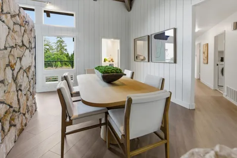 a kitchen with stainless steel appliances a refrigerator sink and stove