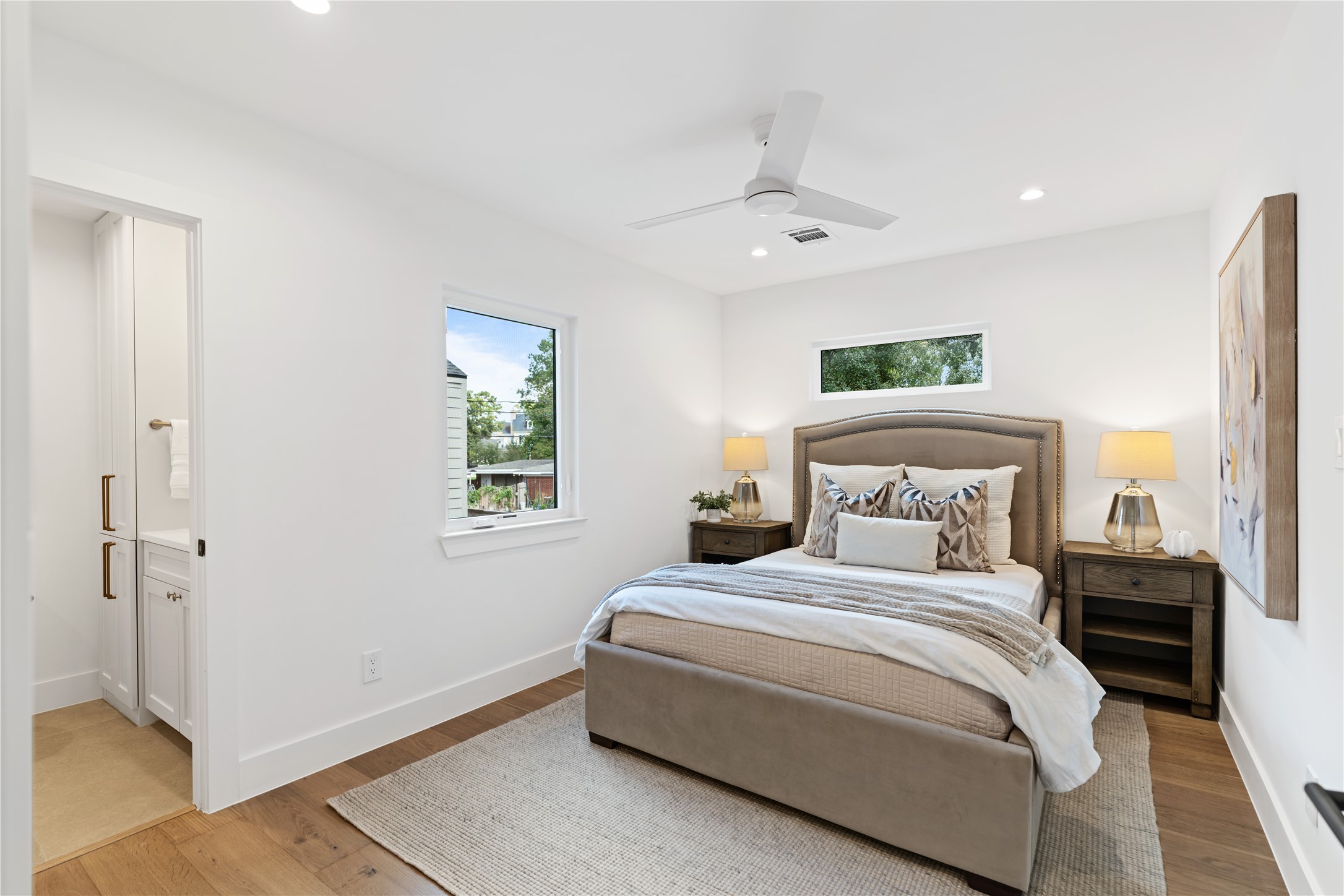 814 Azalea Street Houston, TX 77018 - Photo 17 of 31 Light-filled secondary bedroom with ensuite bath access