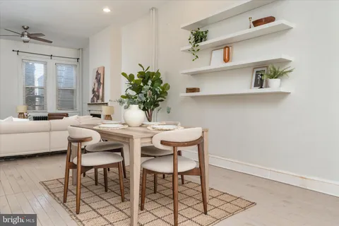 a view of a livingroom with furniture and window