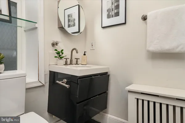 a bathroom with a sink and a toilet