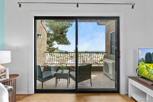a view of a living room and a window