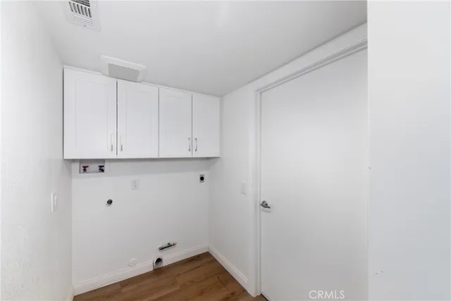 a view of room with hardwood floor