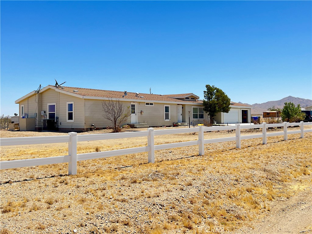 32359 Pinto Road Helendale, CA 92342 - Photo 1 of 1 a view of a swimming pool with an ocean view