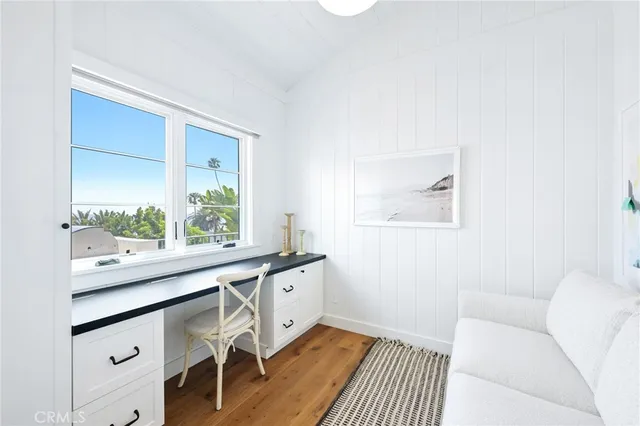 a living room with a sink and a window
