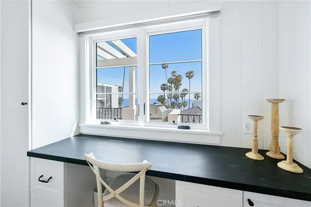 a view of table and chair in a room