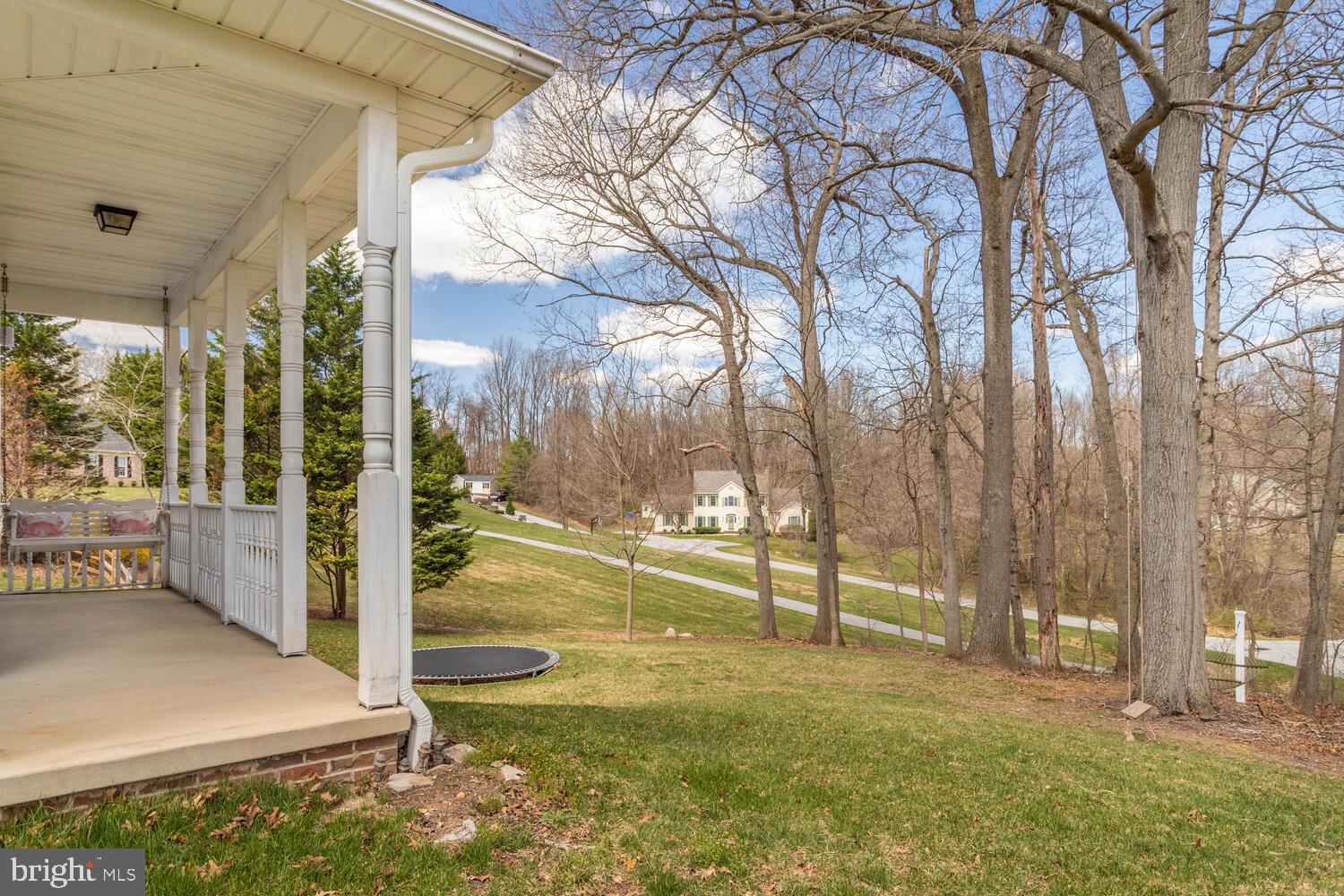 8 Grace Ridge Court Monkton, MD 21111 - Photo 70 of 79 side porch swing, inground trampoline & tree swing