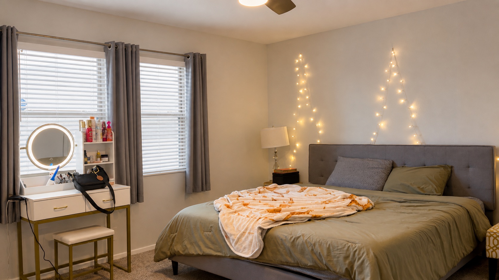 6016 Signal Point Austin, TX 78724 - Photo 10 of 20 Sun-filled bedroom featuring wide windows, soft carpeting, and a modern ceiling fan.