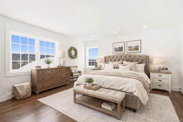 a bed room with furniture and a window