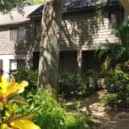 a backyard of a house with lots of green space