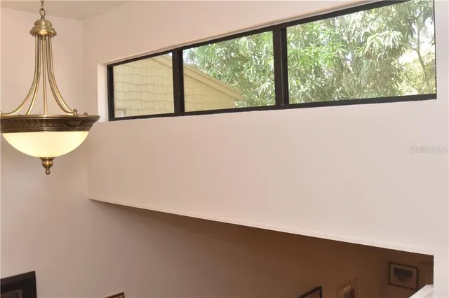 a view of a room with a window