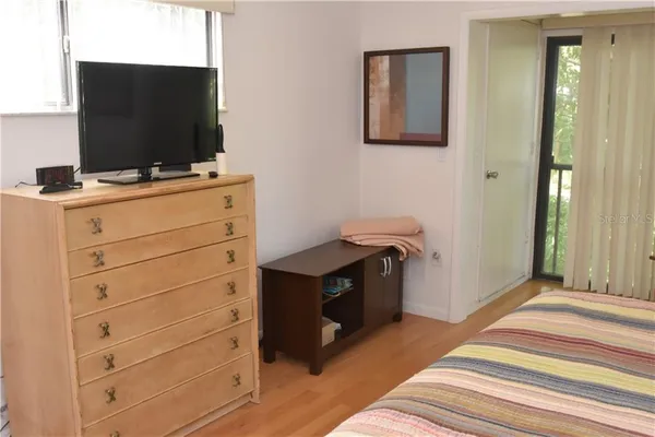 a room with cabinet and flat screen tv